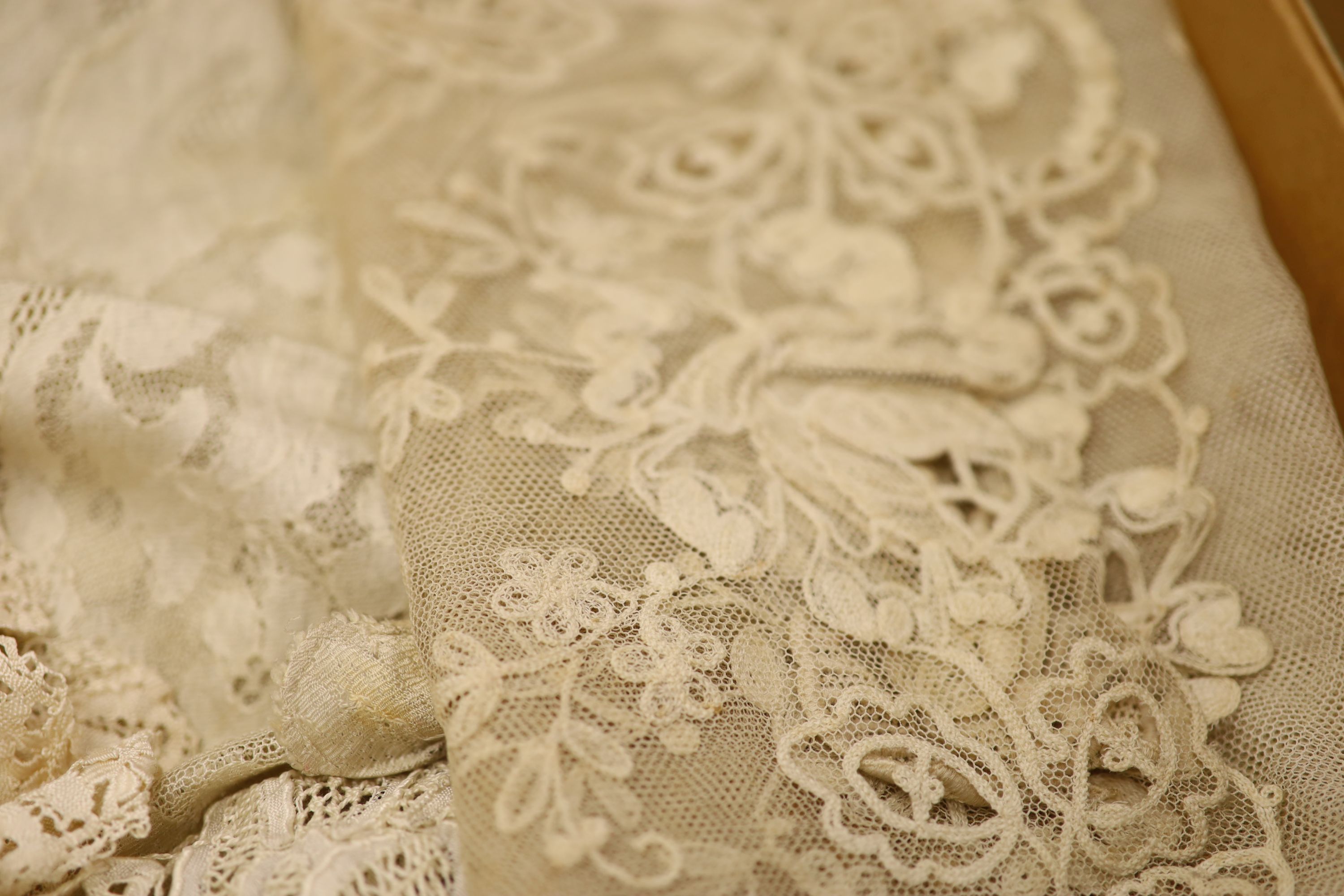 A silk lace stole, collar and Maltese collar, christening shawl, tape lace collar, a metallic gold and silver machine lace panel etc